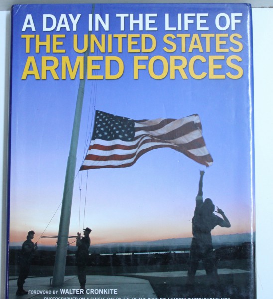 A DAY IN THE LIFE OF THE UNITED STATES ARMED FORCES by MATTHEW NAYTHONS and LEWIS J. KORMAN , 2003