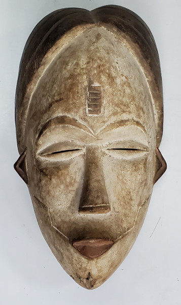 Puno Lumbo, Masca, Gabon, Secol XX